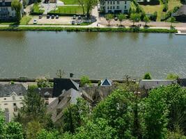 The small city of Saarburg at the saar river in germany photo