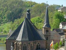 The small city of Saarburg at the saar river in germany photo