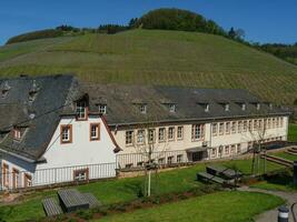 The small city of Saarburg at the saar river in germany photo