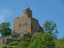 The small city of Saarburg at the saar river in germany photo