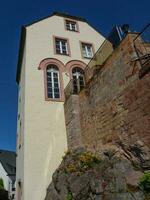 The small city of Saarburg at the saar river in germany photo