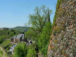 The small city of Saarburg at the saar river in germany photo