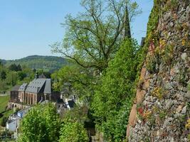 The small city of Saarburg at the saar river in germany photo