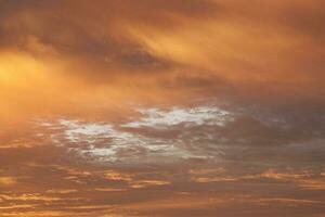 colorful red, blue, and yellow sky in the evening in a rural area in Thailand, when the sun has set, is a panoramic view of the warmth. Hot, hot and scary photo