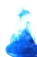 Liquid smoke ink drop effect blue on white background photo