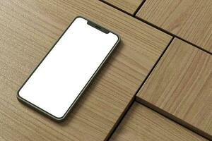 Smartphone mockup on a wodden coffee table surface photo