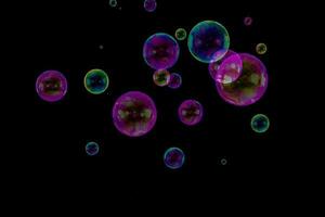 Soap bubbles composition overlay black background photo