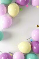 Fun colorful balloons vertical frame photo