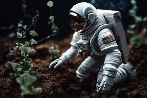 An astronaut planting trees on the soil. Astronaut harvesting plants on an alien planet. An astronaut wearing a space suit, planting trees on the soil. Tree plantation program on space. . photo