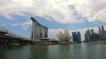 Time lapse of the Singapore city. The magnificent Marina Bay Sands hotel from the river, Singapore. panning. video