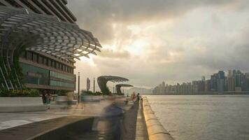 HONH KONG. Time lapse 4k View of people in Hong Kong city at Victoria Harbour. sunrise video