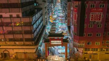Hong Kong. 4k temps laps de Hong Kong, Chine - le nuit marché. Zoom dans video