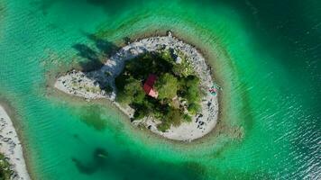 Aerial View of the Schonbichl Island at Eibsee Lake video