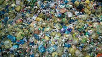 Pile of Trash Bags Awaiting Processing in a Waste Sorting Facility video