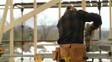 Worker in His 40s and Circular Saw Cutting Job video