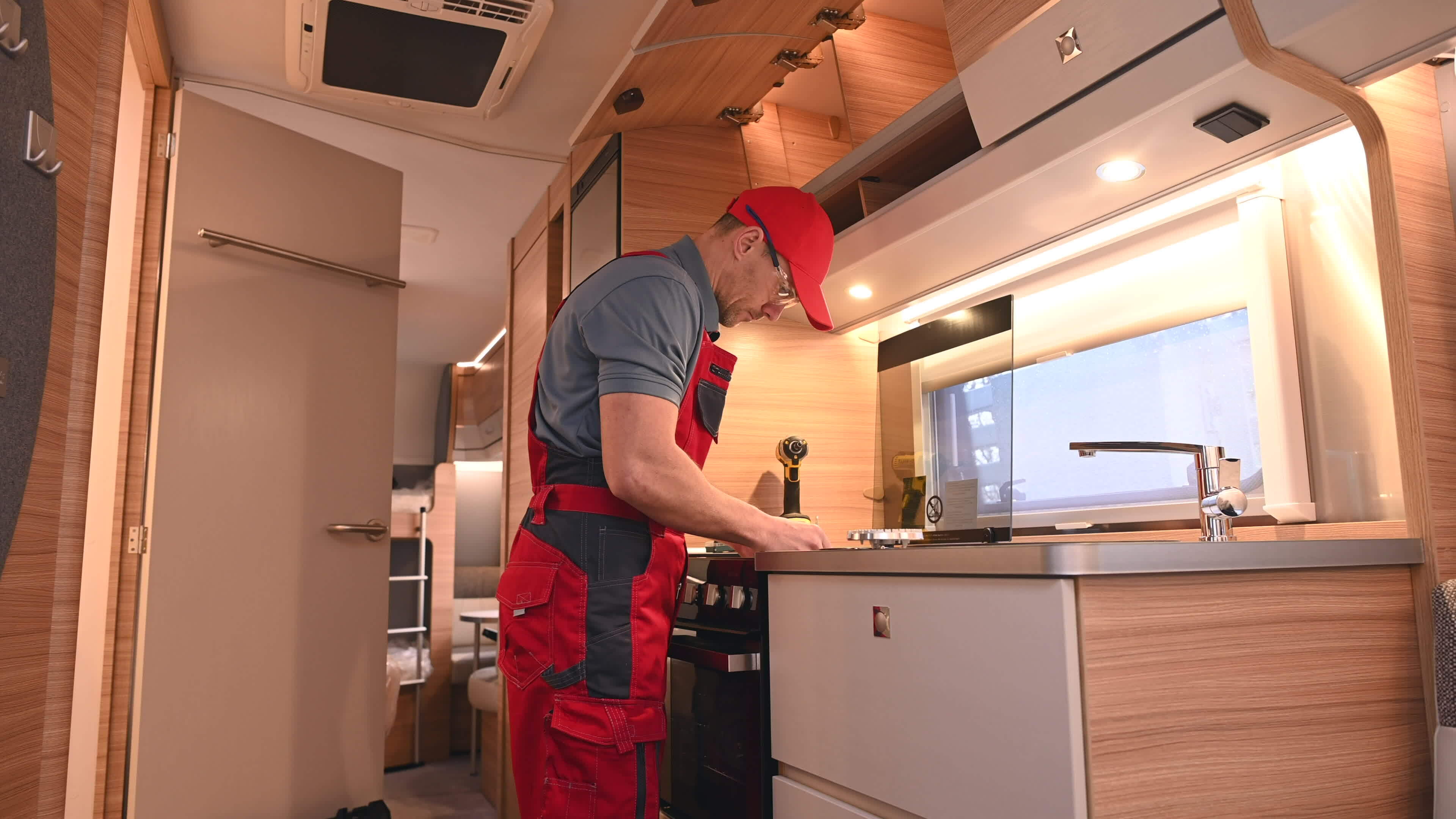 Servicing Stove Burners Inside Motorhome RV 24572403 Stock Video at