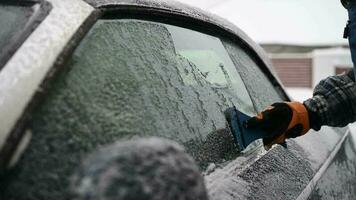 Ice Removing From Car Windows During Cold Weather video