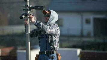 Professional CCTV Technician Installing IP Cameras video