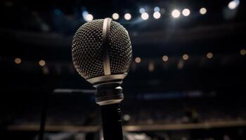 Shiny chrome microphone stand on blue background photo