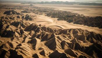 Majestic mountain range, eroded sand dunes, tranquil sunset generated by AI photo