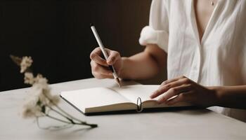 Young adult studying indoors, holding book and pen generated by AI photo