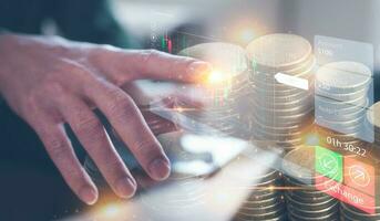 investment stock market data analysis concept, businessman  analyst virtual trading graph with blurred coins, trading online, financial mobile application platform, exchange cryptocurrency marketing photo