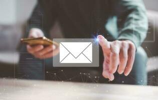 email and document concept, businessman  reviewing reading sending email to clients, business promotion, online document, social distancing practice, online conmunication photo