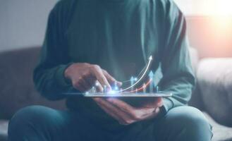investment financial planning and strategy, Stock market, Business growth, progress or success concept. Businessman, trader is showing a growing virtual hologram stock, trading online photo