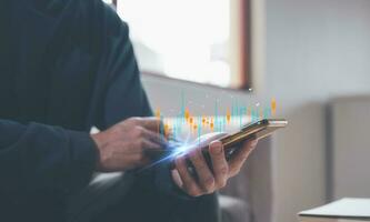 investment stock market data analysis concept, businessman using smartphone analyst  virtual trading graph, trading online, financial mobile application platform photo