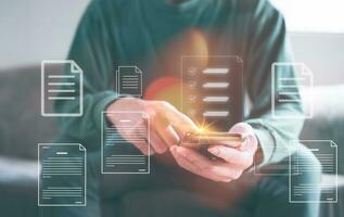Document data system Report HR technology Concept, Businessman Manager checking white documents reports papers of files icon in modern office, paperless documents photo
