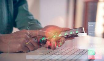 financial investment concept, businessman typing on computer keyboard  touching virtual trading graph buy and sell share in concept of investment business growth and marketing photo