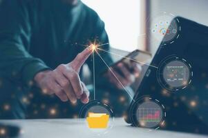 Analyst working with Business Analytics and Data Management System on computer, make a report with KPI and metrics connected to database. Corporate strategy for finance, operations, sales, marketing photo