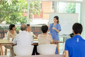 Nursing Home Care concept.Group of happy Asian seniors. photo