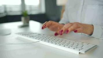 Woman typing on a computer keyboard. Concept of remote work video