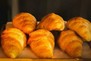 Golden Delight a flaky freshly baked croissant. photo