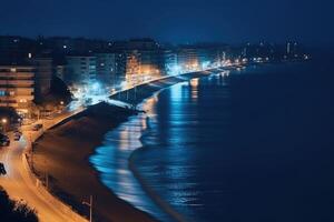 aerial photo from drone of beautiful city and the beach at night ,
