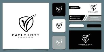 Eagle logo vector symbol with business card design Premium Vector