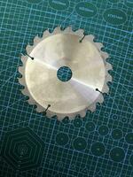 steel circular saw blade on the table photo