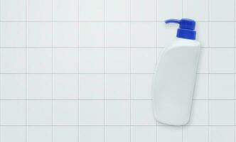 Top view Liquid soap bottle with tile background Bathroom accessories photo