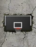 Basketball hoop on cement wall through the with cracks photo