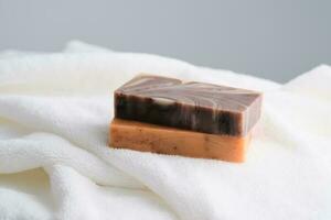 Beauty handmade soap on a terry towel. photo