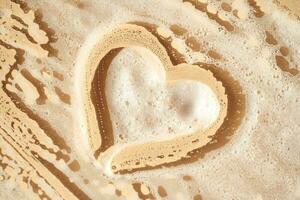 Photo of cosmetic foam or soap with a heart drawn on the foam.