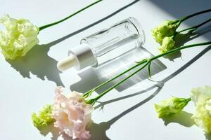 Serum with a dropper with spring flowers. photo