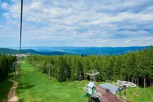 Mountains with open cable cars lift, Karpacz, Poland photo