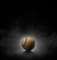 baseball ball with on black background with smoke photo