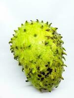 Soursop fruit on white isolated background. Annona muricata. photo