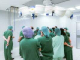 The medical team in the hospital operating room is blurry photo
