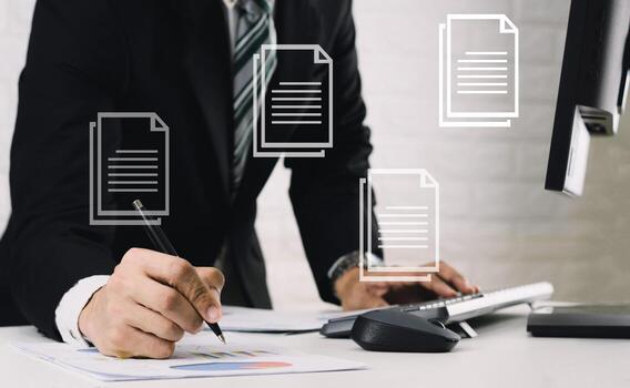 Document Management System concept Business men work on the table Analyze graphs financial report in documents and computers. photo