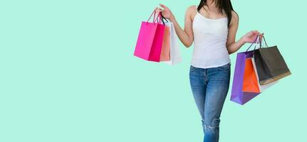 Woman carrying paper bags walking shopping photo