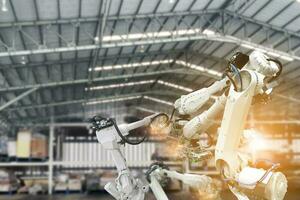 Robotic arms, industrial robots, factory automation machines photo